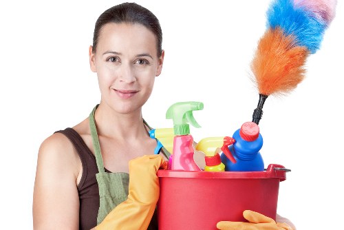Cleaner in Putney preparing a safe cleaning setup