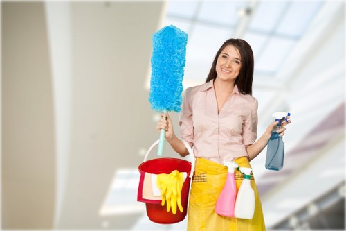 Cleaning staff using safe methods and protective equipment