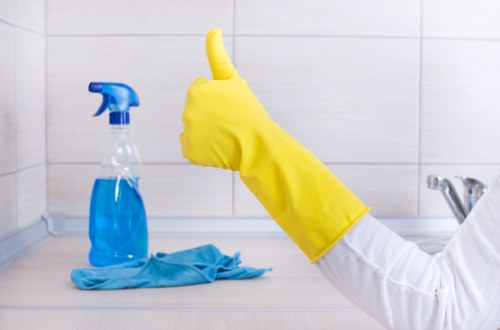 Professional cleaners maintaining a retail unit in Putney