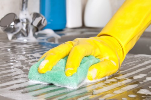 Supervisor reviewing a cleaning job complaint and service notes