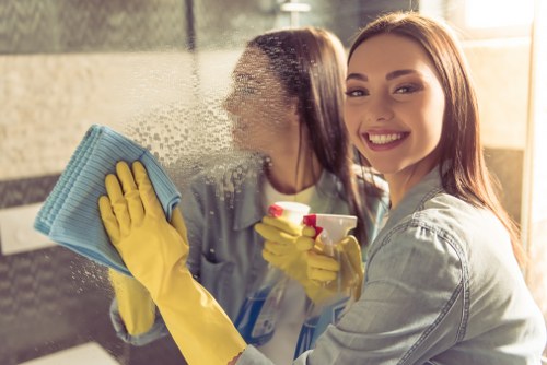 Local cleaner resetting a Putney apartment after guest checkout